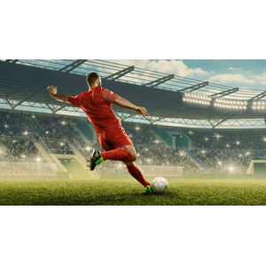 Umělecká fotografie Soccer player kicks a ball, Yuliia Zatula, (40 x 22.5 cm)