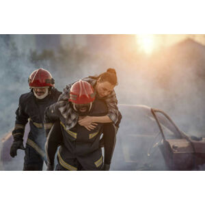 Umělecká fotografie Firefighters rescue a woman, carrying her, boonchai wedmakawand, (40 x 26.7 cm)