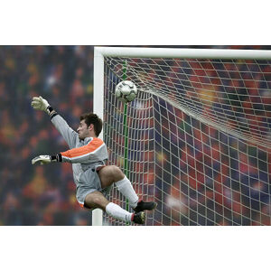 Umělecká fotografie Male football goalie trying to block goal in air, Photo and Co, (40 x 26.7 cm)