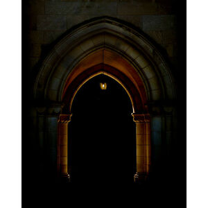 Umělecká fotografie Stone archway lit by lantern, Michael Duva, (30 x 40 cm)