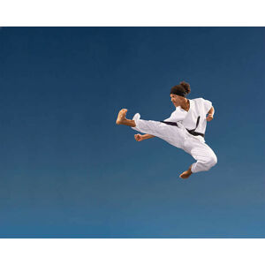 Umělecká fotografie Teenage boy  kicking in mid-air,, Siri Stafford, (40 x 30 cm)