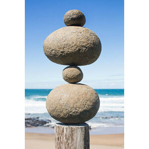 Umělecká fotografie Tower of rocks balancing on a wooden pole, Dimitri Otis, (26.7 x 40 cm)