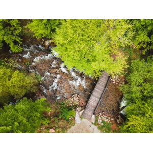 Umělecká fotografie Small wooden bridge over river in, SStajic, (40 x 30 cm)